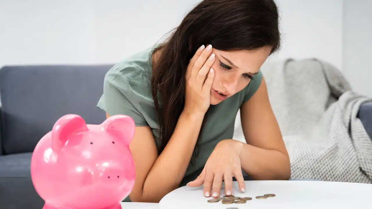 woman counting coins