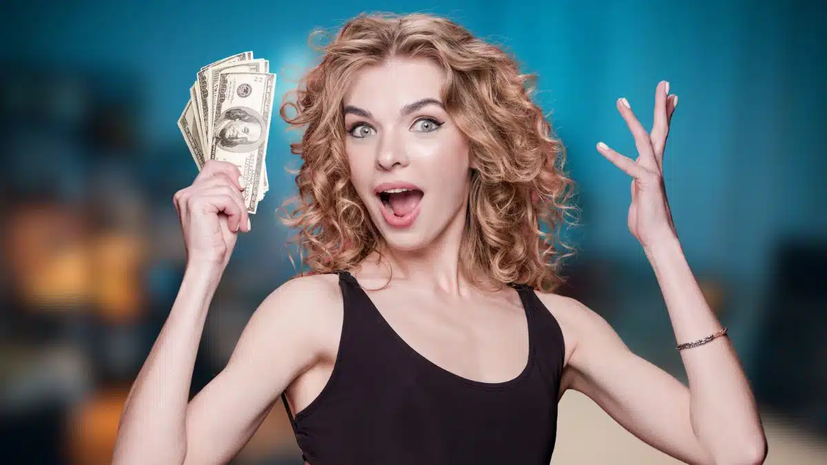 woman with cash at home