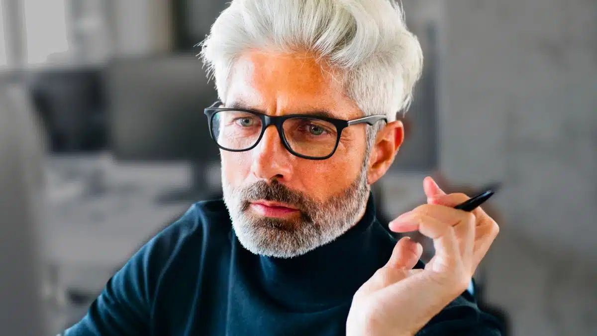 man glasses business office laptop