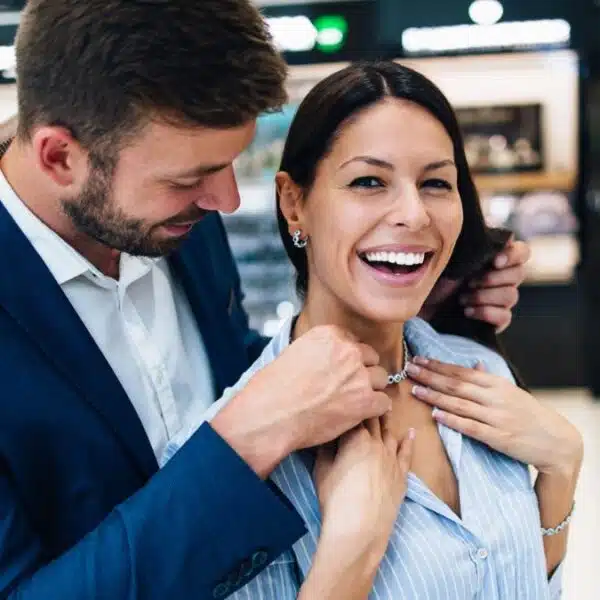 couple buying jewelry at a mall