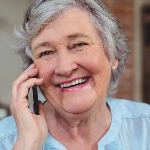 senior woman outside talking on the phone
