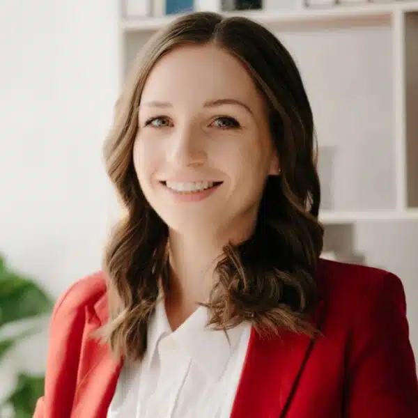 woman boss sitting at a desk smiling